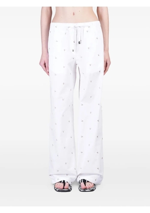 The Attico logo-embroidered trousers - White