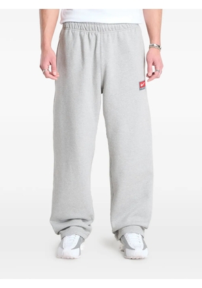 Nike Solo Swoosh open-hem track pants - Grey