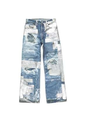 Acne Studios ripped patchwork jeans - Blue