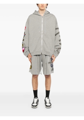 Mastermind Japan slogan-patch hoodie - Grey