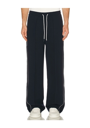 KROST Piping Track Pant in Navy. Size S. Also in M, L, XL/1X.