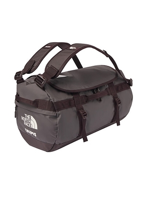 The North Face x SKIMS Small Base Camp Duffel Bag in SK Phoenix - Brown. Size all.