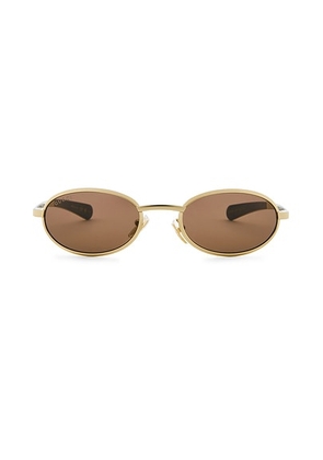 Gucci Oval Sunglasses in Gold & Brown - Metallic Gold. Size all.