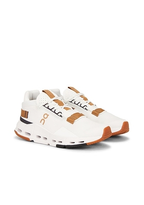 On Cloudnova 2 Sneaker in Ivory & Sphinx - White. Size 10 (also in 5, 5.5, 6, 6.5, 7, 7.5, 8, 8.5, 9, 9.5).