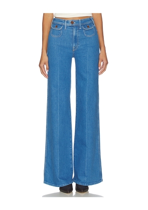 MOTHER The Pocketbook Hustler Roller Heel Jeans in Blue. Size 29. Also in 32.