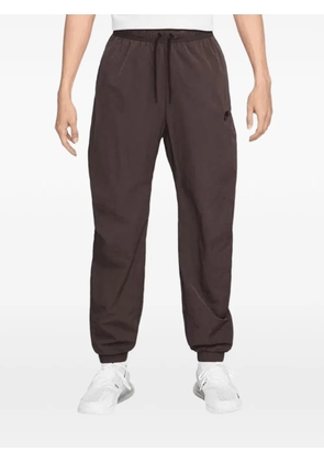 Nike logo-embroidered track pants - Brown