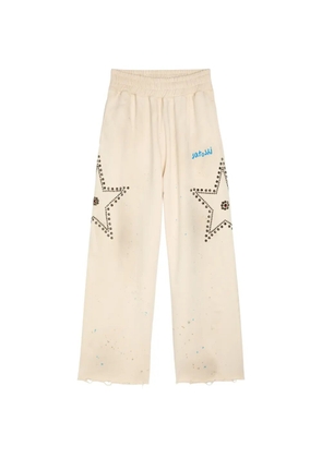 SATOSHI NAKAMOTO star studded trousers - Neutrals