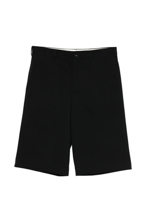 Comme des Garçons Homme Plus button-fastening trousers - Black