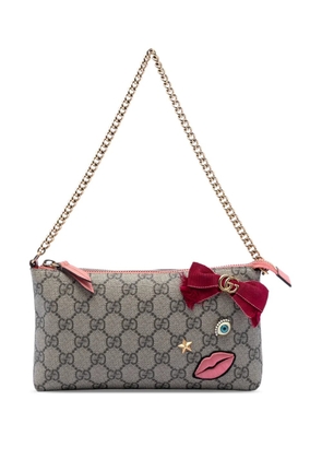 Gucci Pre-Owned 2000-2015 GG Supreme Face Embellished Wallet on Chain crossbody bag - Brown