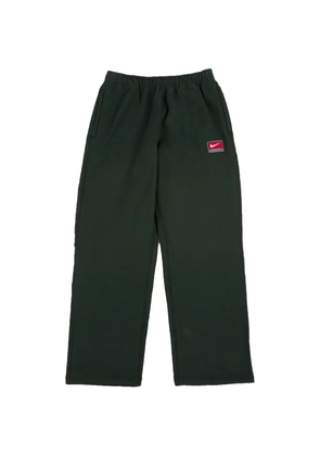 Nike Solo Swoosh track pants - Green