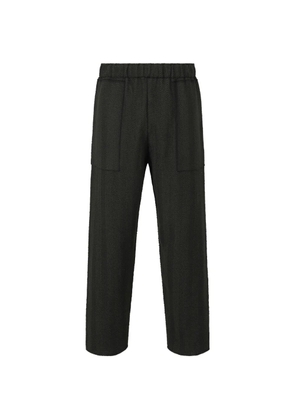 Homme Plissé Issey Miyake herringbone pocketed straight-leg trousers - Black