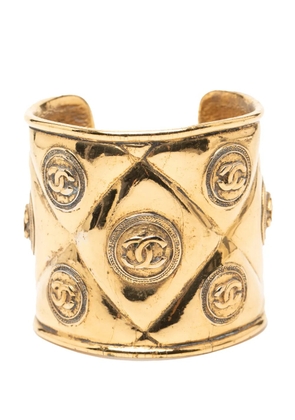 CHANEL Pre-Owned 1970-1980 CC Gold Plated Medallion Quilted Cuff Bracelet costume bracelet