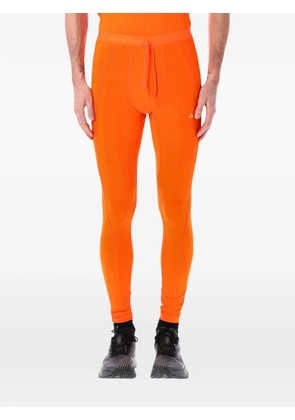 Nike Wildsee drawstring leggings - Orange