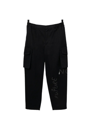 Comme Des Garçons Shirt text-print twill tapered trousers - Blue