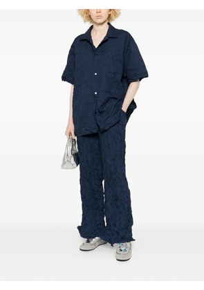 Gongdid Design crinkled flared trousers - Blue