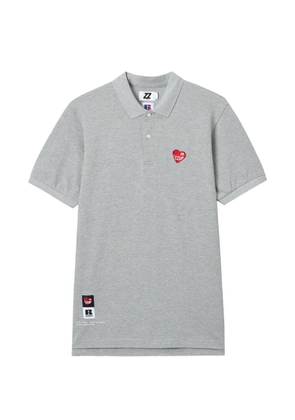 izzue logo-appliqué polo shirt - Grey