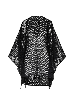 Johanna Ortiz geometric-pattern V-neck poncho - Black