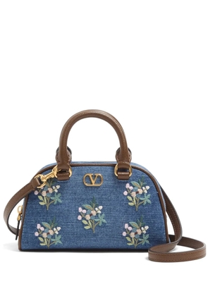 Valentino Garavani Vlogo Signature mini top-handle bag in denim with floral embroidery - Blue
