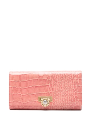 Versace Pre-Owned 1990s croc-embossed clutch bag - Pink