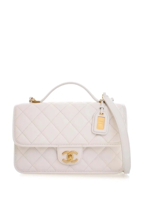 CHANEL Pre-Owned 2021-2025 Medium Quilted Caviar School Memory Top Handle Flap satchel - White