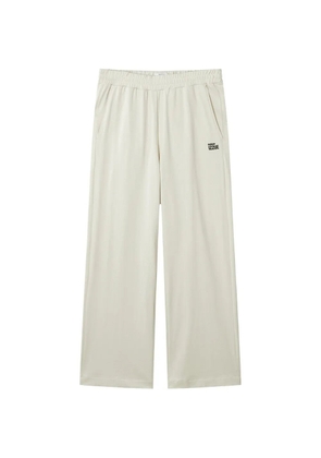 izzue logo-detail trousers - Neutrals