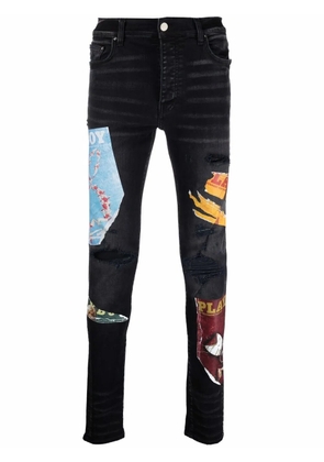 AMIRI x Playboy magazine print super-skinny jeans - Black