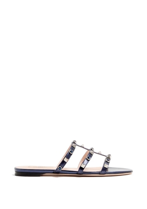 Valentino Garavani Rockstud slide sandals in laminated nappa with cabochon - Blue