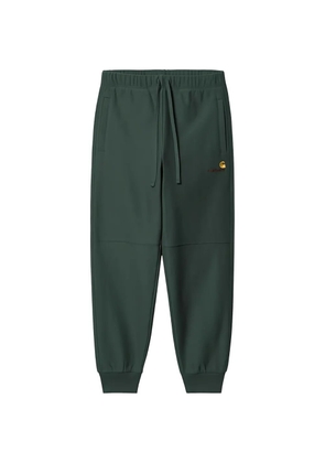 Carhartt WIP American Script track pants - Green