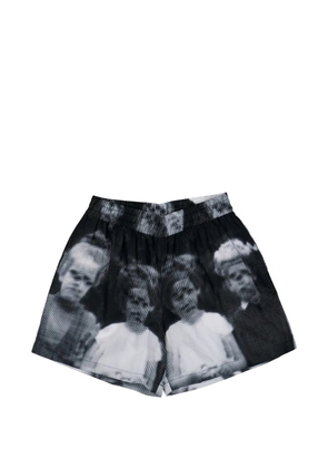 Walter Van Beirendonck portrait-print embroidered logo shorts - Black