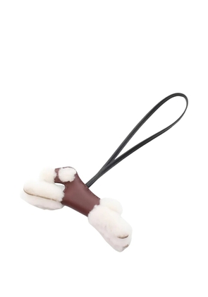 Hermès Pre-Owned 2025 Buddy rouge serie mouton leather charm - Brown