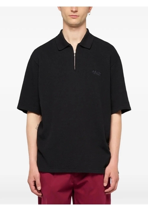 Edwin Rick logo-embroidered polo shirt - Black