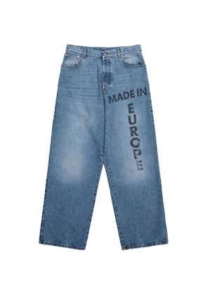 VETEMENTS text-print jeans - Blue