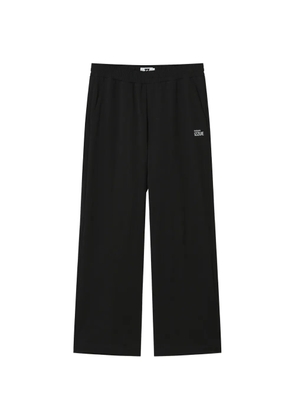 izzue logo-embroidered trousers - Black
