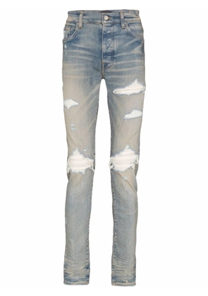 AMIRI MX1 Ultra suede-patches skinny jeans - Blue