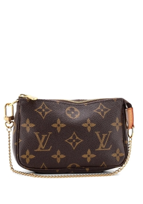 Louis Vuitton Pre-Owned Pochette Accessoires Monogram Canvas Mini clutch bag - Brown