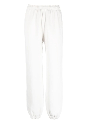 Nike Solo Swoosh embroidered track pants - White
