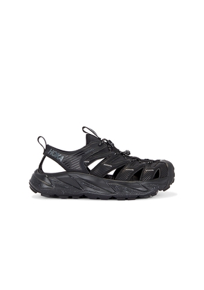 HOKA U Hopara in Black. Size 9. Also in 10, 10.5, 11, 11.5, 12, 13, 14, 9.5, Mens 5 / Womens 6, Mens 5.5 / Womens 6.5, Mens 6 / Womens 7, Mens 6.5 / W