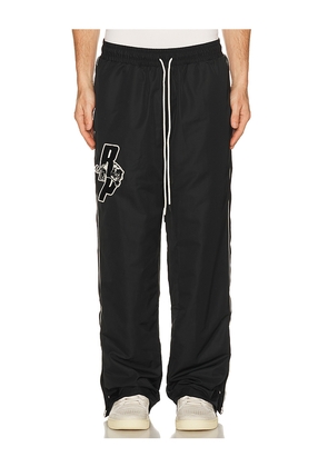 Puma Select Represent Pant in Black. Size S. Also in M, L, XL/1X.