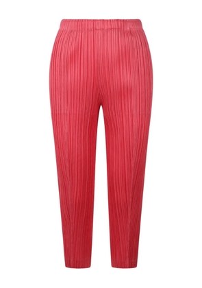 Pleats Please Issey Miyake pleated cropped trousers - Pink
