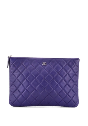CHANEL Pre-Owned O Case Quilted Lambskin Medium clutch bag - Purple