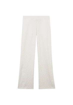 GCDS monogram-pattern trousers - Neutrals