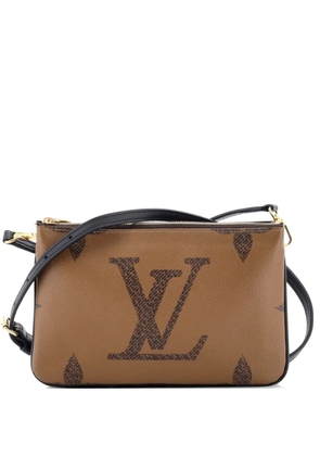 Louis Vuitton Pre-Owned Double Zip Pochette Reverse Monogram Giant clutch bag - Brown