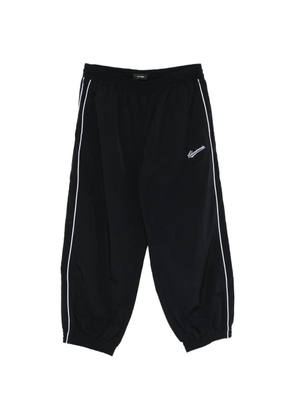 Willy Chavarria logo-embroidered trousers - Black