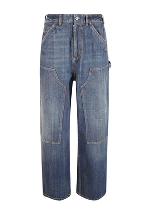 Maison Margiela stitching-detailing distressed wide-leg jeans - Blue