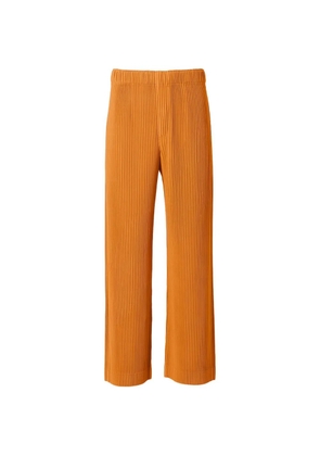 Issey Miyake October pleated trousers - Orange