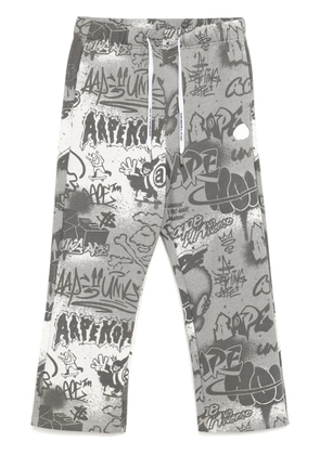 AAPE BY *A BATHING APE® graffiti-print track pants - Grey