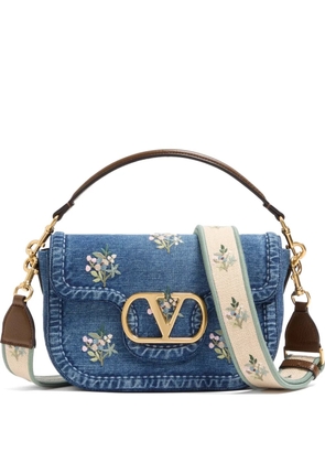 Valentino Garavani Alltime medium embroidered denim shoulder bag with embroidered ribbon strap - Blue