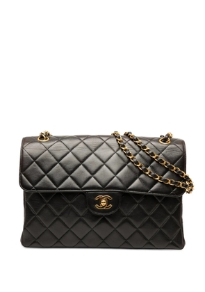 CHANEL Pre-Owned 1996-1997 Jumbo Quilted Lambskin Double Sided Flap shoulder bag - Black