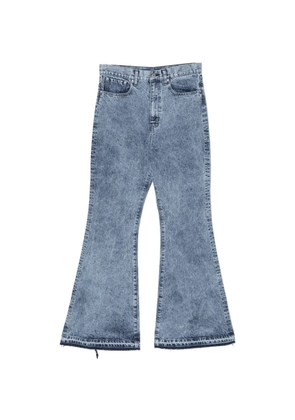 Junya Watanabe MAN frayed-hem jeans - Blue