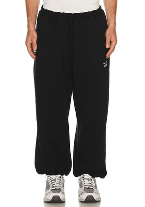 COMME des GARCONS HOMME Sweatpants in Black - Black. Size L (also in M).